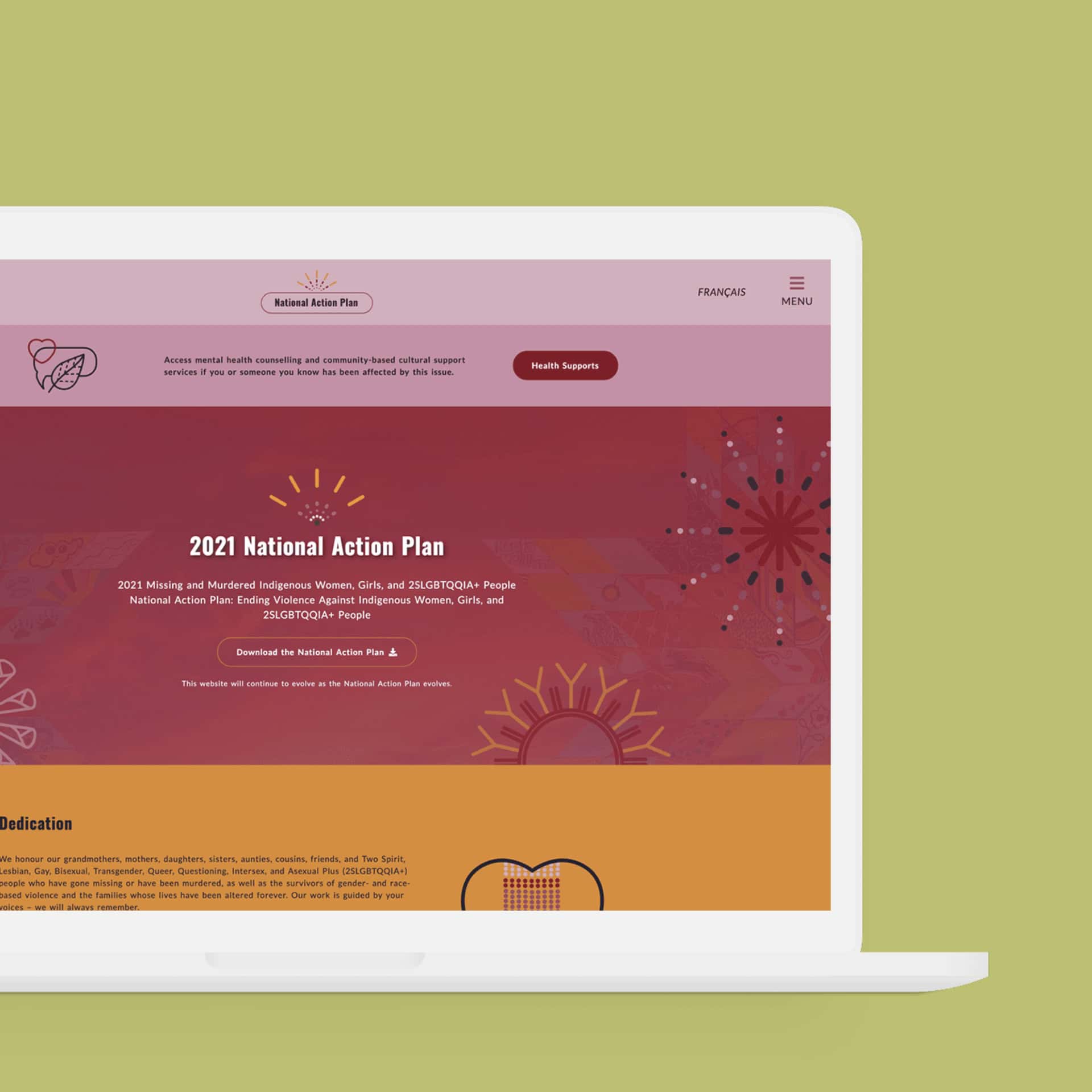 A macbook mockup of the 2021 National Action Plan website. The site features the main page that gives a blurb about the National Action Plan and a Dedication section.