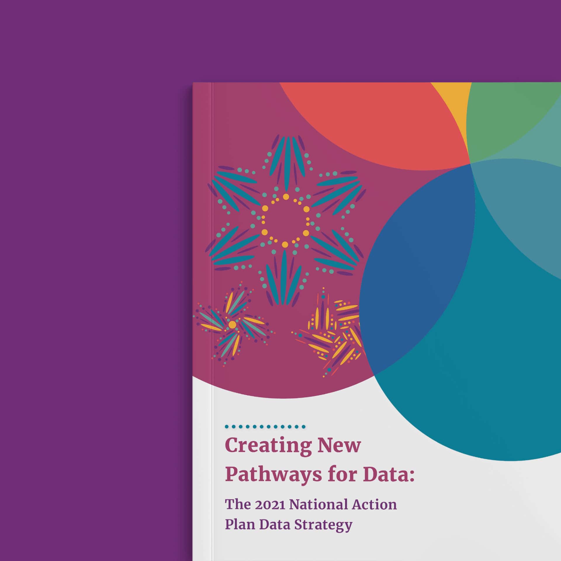 The cover for the Creating New Pathways for Data: The 2021 National Action Plan Data Strategy booklet. The cover features several circles intersecting each other with a beadwork-like pattern consisting of circles and ovals.